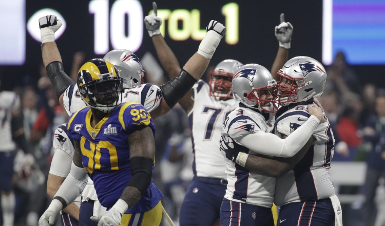 Jugadores de los Patriotas festejan. AP