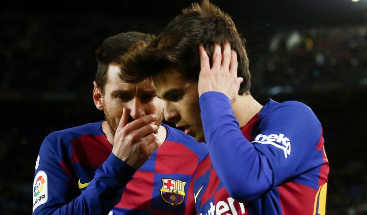 Messi y Ricard Puig. Foto:EFE