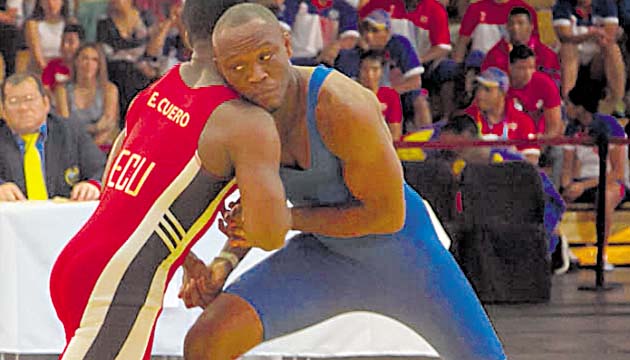 Familia. Elton Brown (derecha) es el hermano de Humberto y ambos son destacados luchadores olímpicos nacionales; incluso, también es peleador de artes marciales mixtas.(Cortesía)