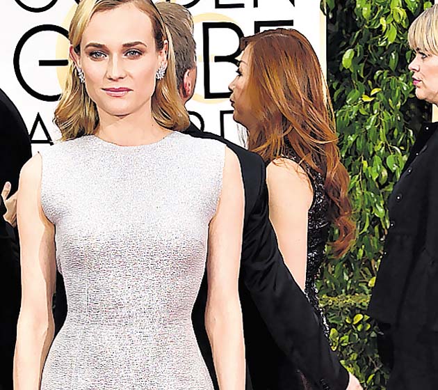 Diane Kruger. Enamoró en la alfombra roja con un elegante diseño de Emilia Wickstead. Entró en la “silver trend”.