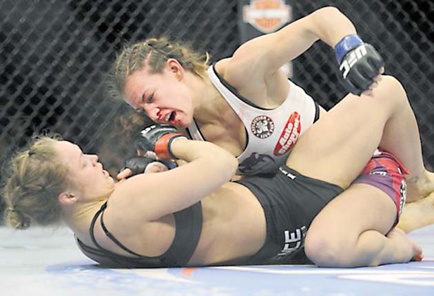 Tate (dcha.) ha perdido dos veces ante Rousey. /Foto AP