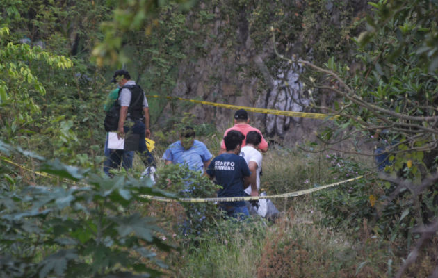 Los restos humanos fueron encontrados en un canal pluvial conocido como Río de Aguas Blancas. FOTO/EFE