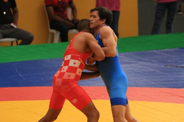 Combate de lucha olímpica. Foto Pandeportes Combate de lucha olímpica. Foto Pandeportes