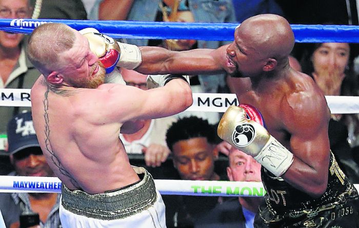 Pelea celebrada en Las Vegas entre  Mayweather Jr. y McGregor. Foto AP