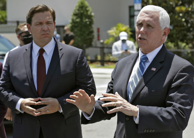 Las declaraciones de Pence (d), se dieron en Orlando, Florida. Fotos: AP. 