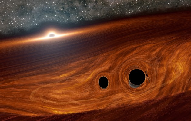 Bosquejo de un inmenso agujero negro y su disco de gas, y dos más chicos en su interior. Foto / R. Hurt/IPAC/Caltech.