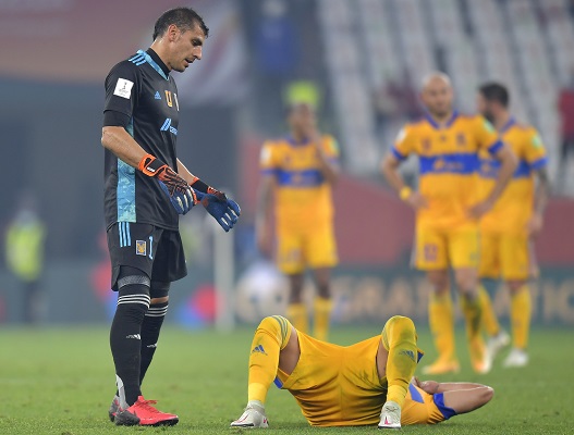 Jugadores del Tigres lamentan la derrota ante los alemanes. Foto: EFE