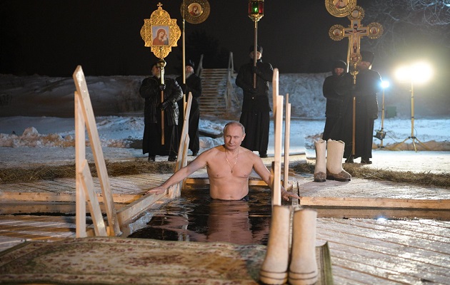 Putin jumps into icy water at the Orthodox Epiphany