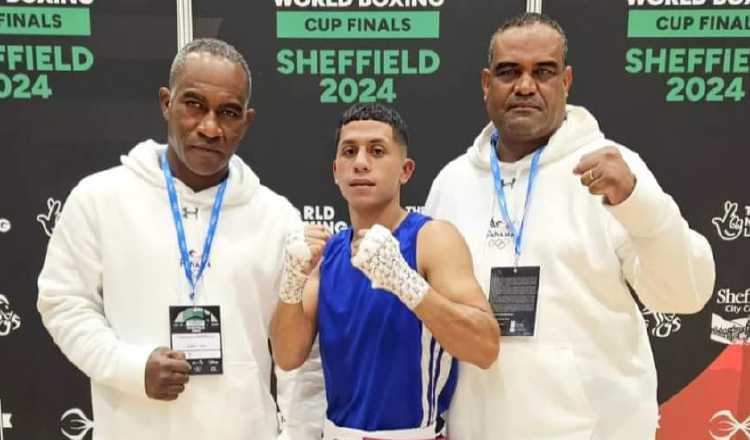 Luis Carlos Pachay (cent.) aseguró bronce. Foto: Fedebop