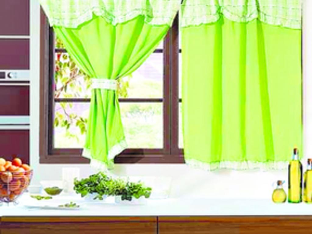 Las cortinas de cocina dan un toque de elegancia y, por lo general, son de tonos bajos o pasteles.()