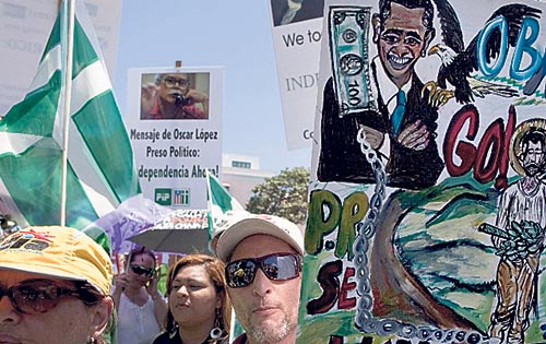 <p>Independentistas. Expresaron su rechazo a la visita oficial.</p>