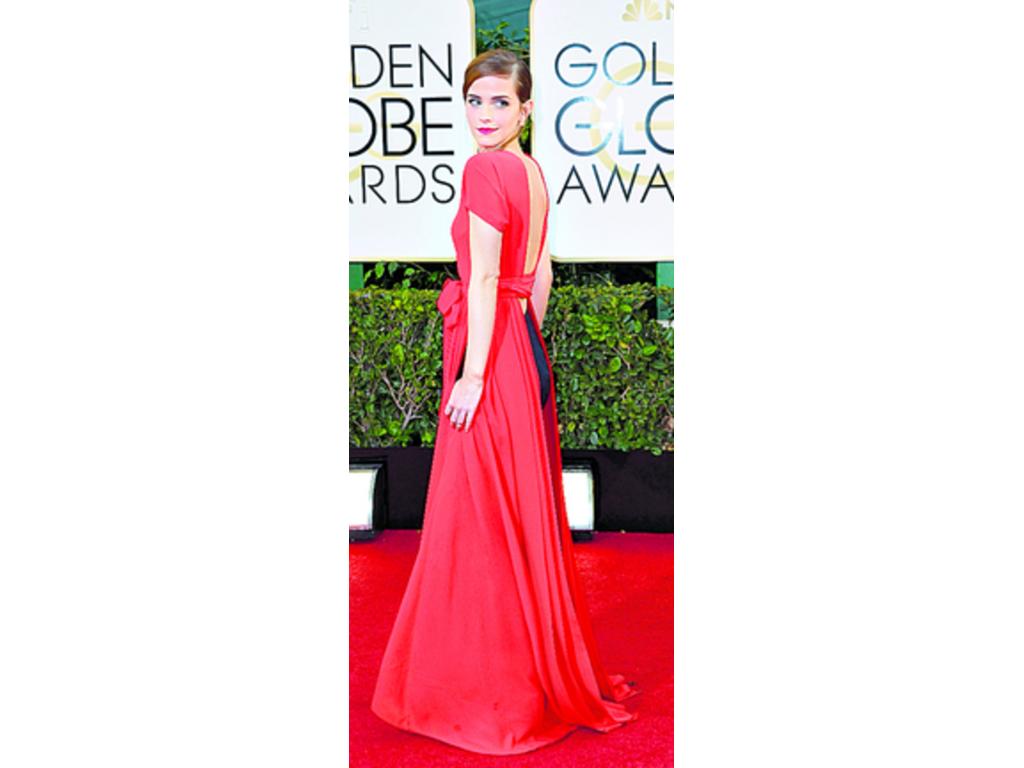 Emma Watson. Encantadora, aunque sus fanáticos esperaban más riesgo de su parte. No creían que fuese a escoger un vestido de Dior Alta Costura como este, con detalle de pantalón negro en la parte de atrás. Aún así, siempre está guapísima. El color rojo pa
