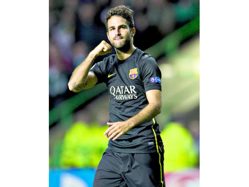 Cesc Fàbregas volvería a ocupar el sitio del ausente Messi.(EFE)