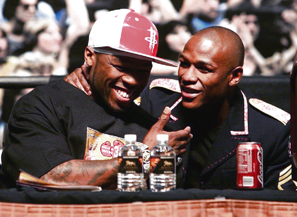 Promotora. 50 Cent (izq.) y Mayweather Jr. se unen.(AP)