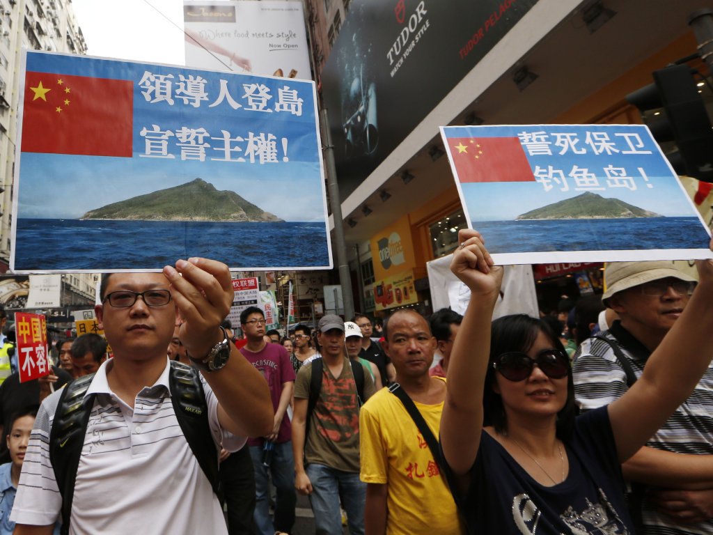 Un grupo de protestantes antijaponese. Foto/AP<br>