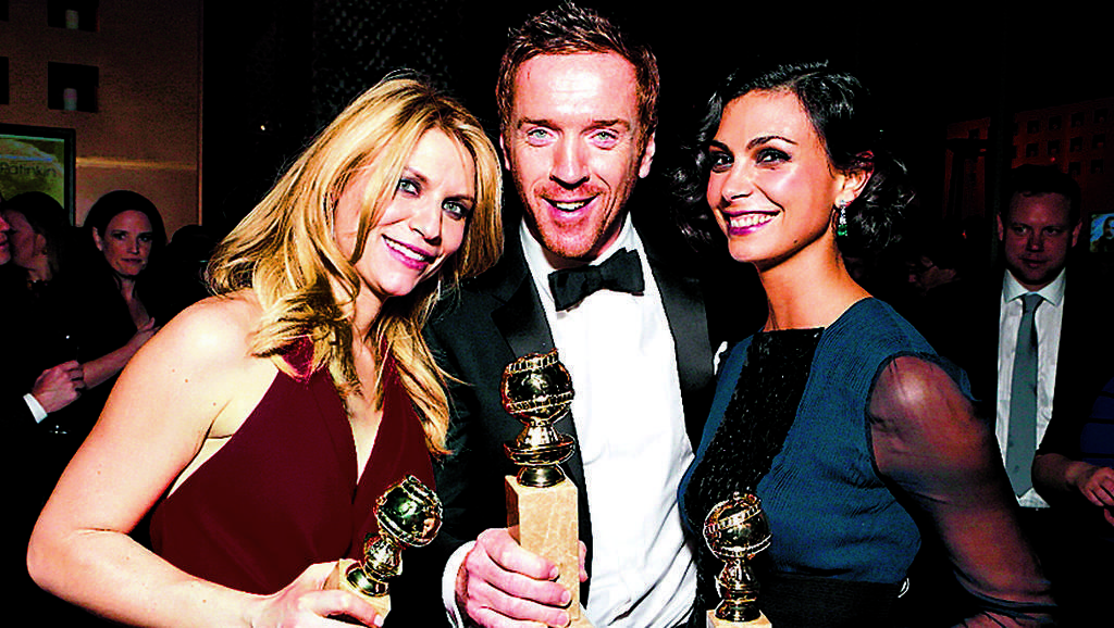 Galardonados. Claire Danes, Damian Lewis and Morena Baccarin con sus premios.(ap)