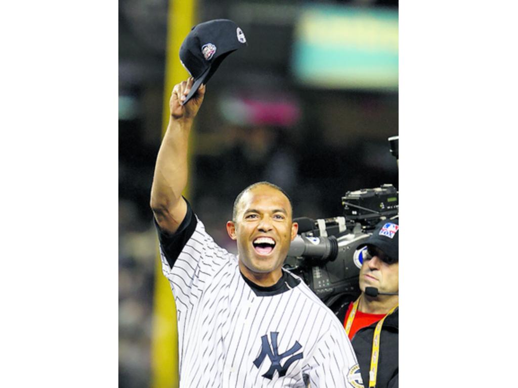Mo celebra uno de los campeonatos de Serie Mundial.(Archivo)