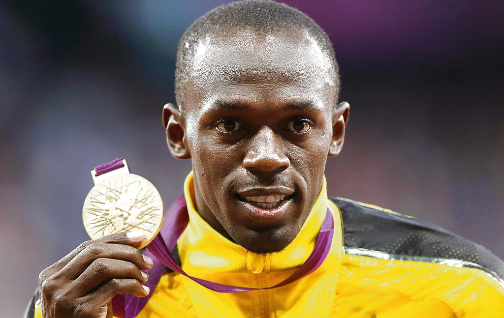 Espectáculo. Usain Bolt recibió ayer la medalla de oro ganada en la prueba de los 100 metros planos.(AP)