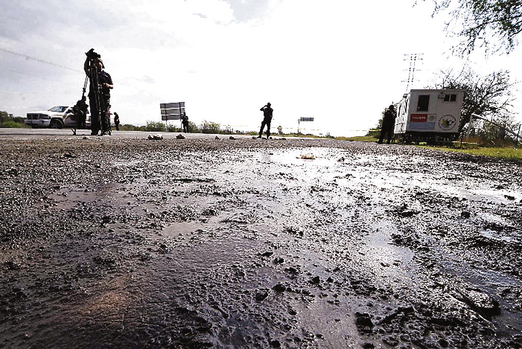 Hechos. Carretera donde fueron halladas las víctimas.(EFE)