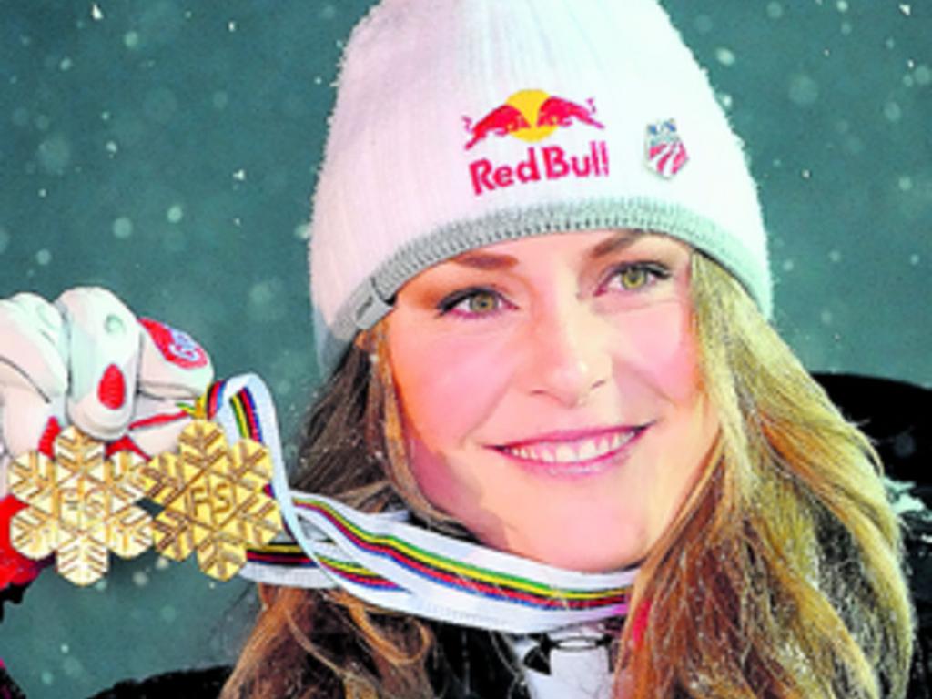 2. Lindsey muestra las medallas ganadas en el Campeonato Mundial.