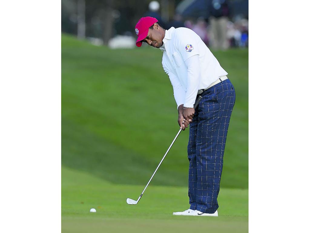Normal. Tiger Woods no tuvo su mejor día.(EFE)