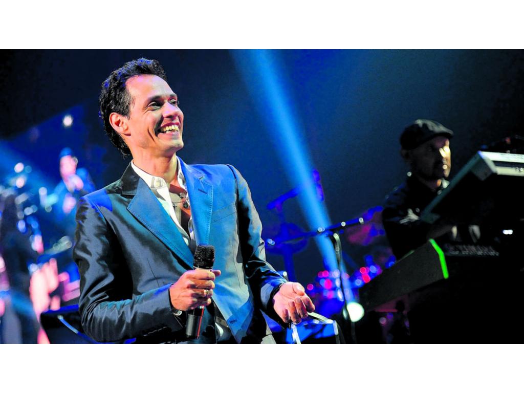 Juan Luis Guerra y Romeo Santos durante su gira por Latinoamérica.