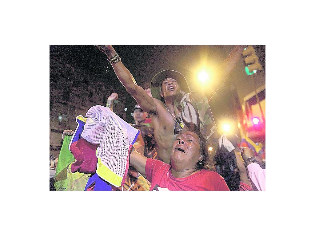 Celebración. Seguidores de Chávez se toman las calles.(AP)