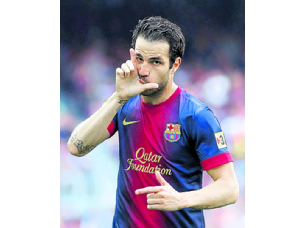 El barcelonista Cesc Fábregas celebra el gol marcado al Málaga. (EFE)