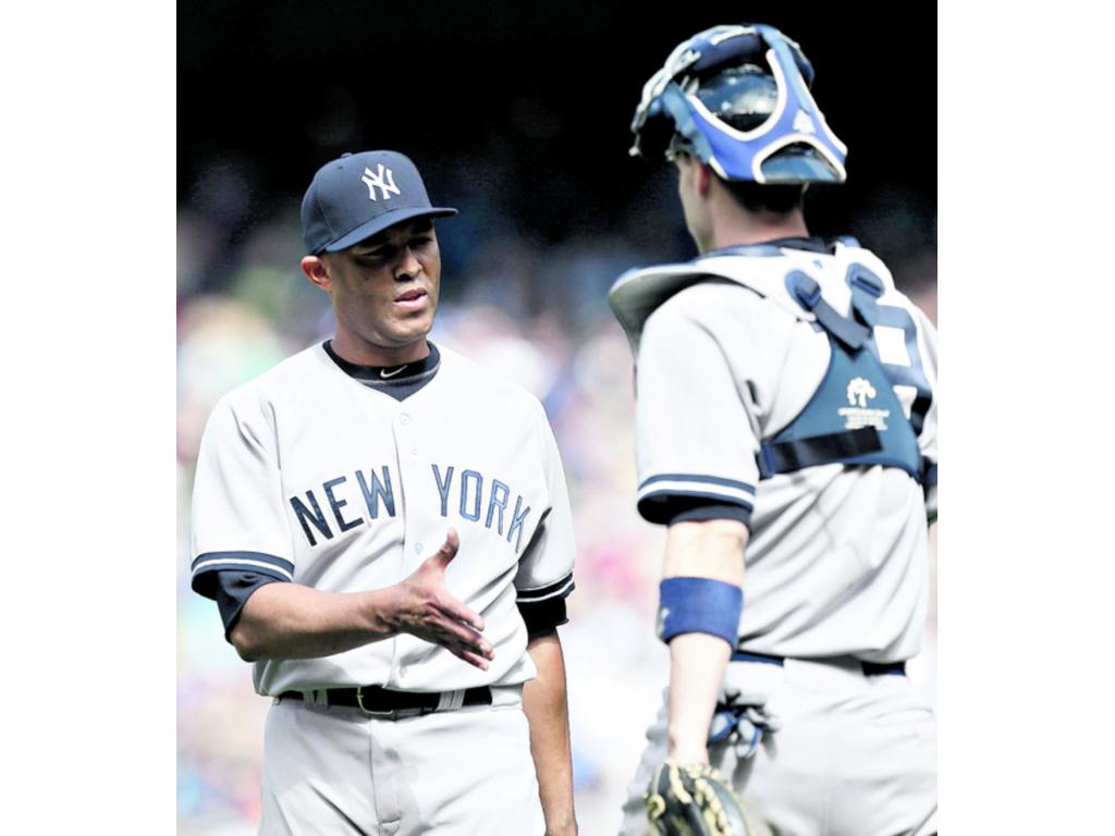 Aficionados de Seattle muestran su cariño a Mariano.