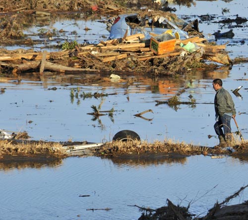 <p>La localidad de Yamamoto está cubierta de basura y agua.</p>