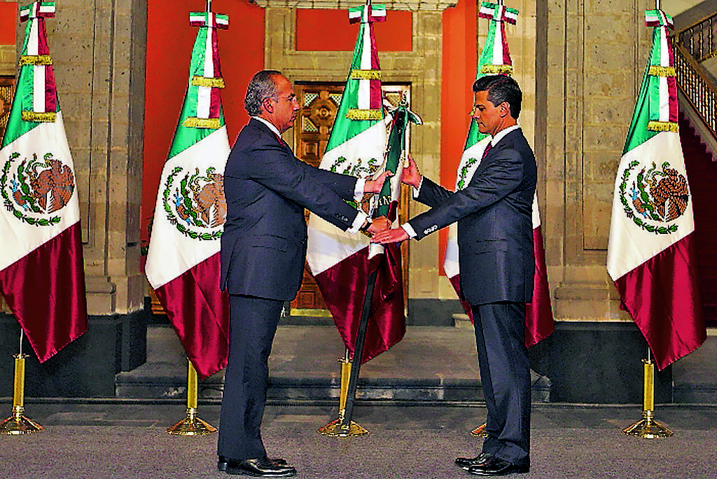 Acto. Traspaso de la bandera mexicana.(EFE)