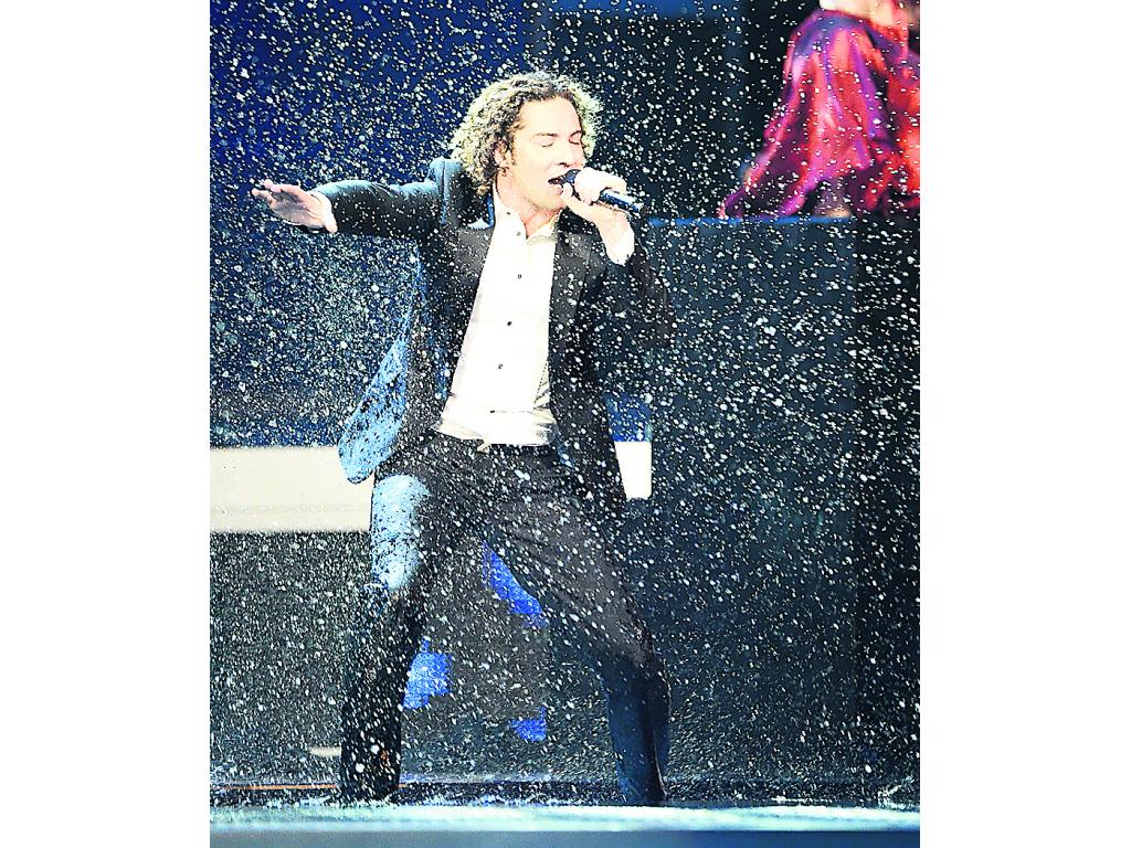 Magistral. David Bisbal salió empapado del escenario, pero fue uno de los más aplaudidos de la noche.()