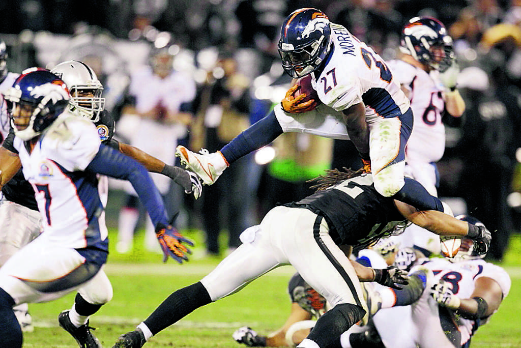 Escape. Knowshon Moreno (27) fue clave.(Archivo)