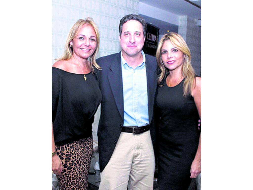 7. Briseida Burgos, César Oduber y Tammy Burgos.
