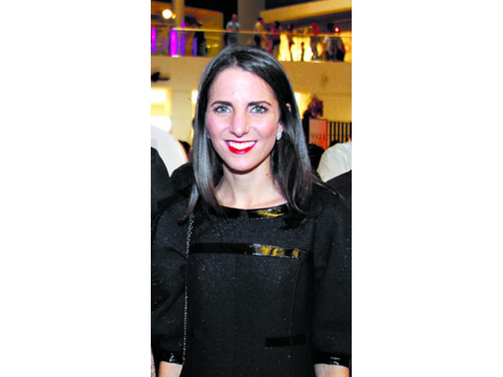 Kelly Talamas lució sencilla pero elegante.
