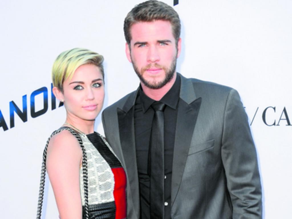 Agosto 8 de 2013. Última aparición de Miley con su expareja Liam. (AP)