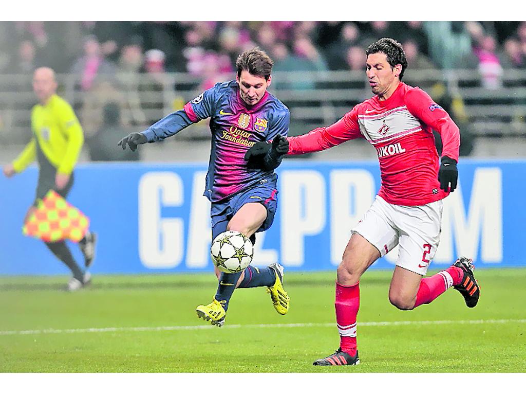 Figura. Lionel Messi (izq.) marcó dos anotaciones.(AP)