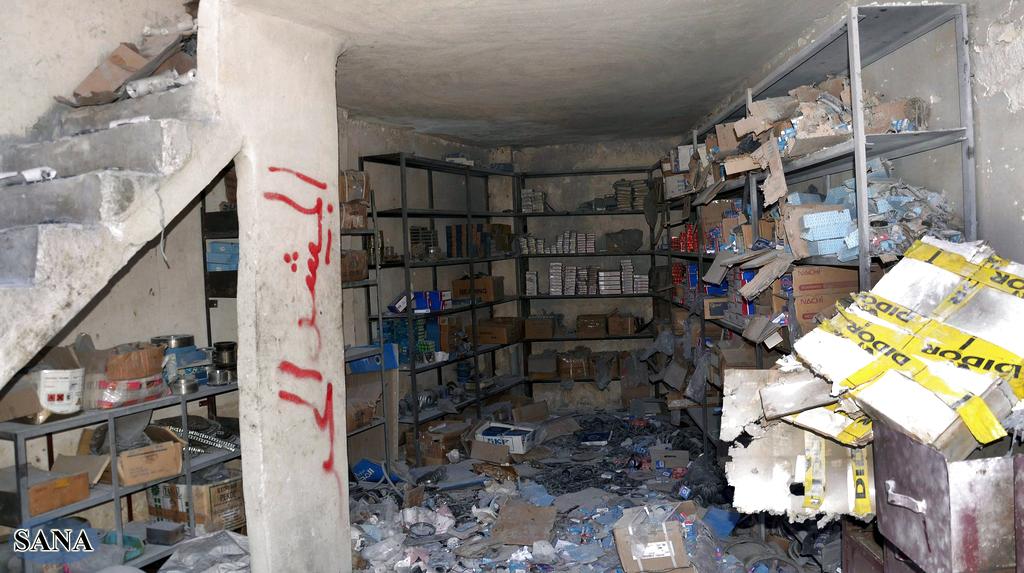 Un local comercial con numerosos daños materiales en la zona de Al-Atareb, en la provincia de Alepo, Siria, controlada por el ejército sirio. Foto/EFE<br>