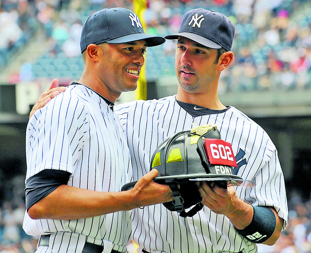 Amigos. Rivera junto al boricua Jorge Posada.(AP)