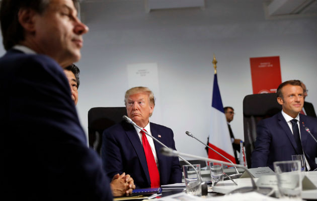 El Presidente Trump cambió rápidamente su postura sobre la guerra comercial de EU con China en el G7. (Carlos Barria/Agence France-Presse — Getty Images)