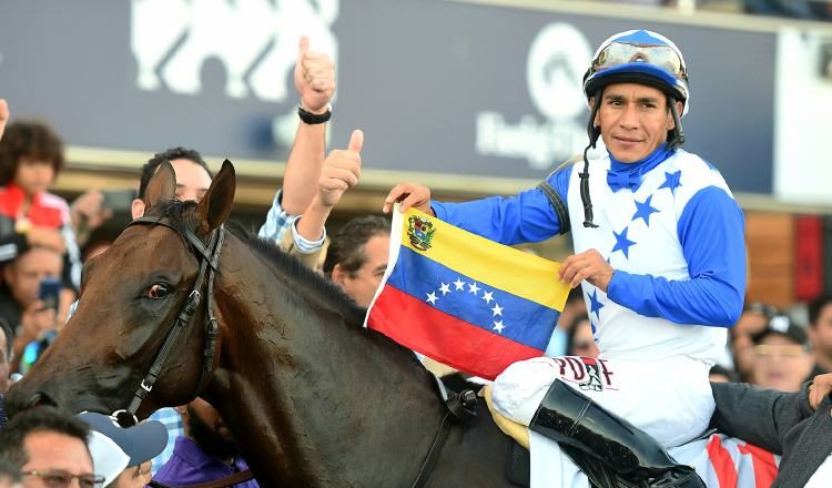 La delegación de Venezuela recibe a The Brother Slew y su jinete Paco Lópz. Adam Coglianese