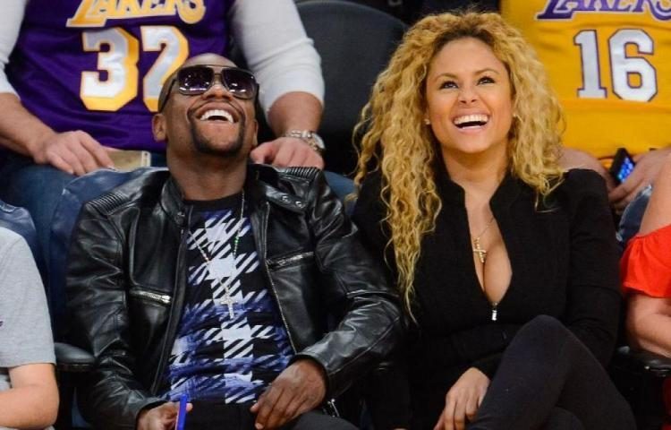 Liza Hernández y Floyd Mayweather.