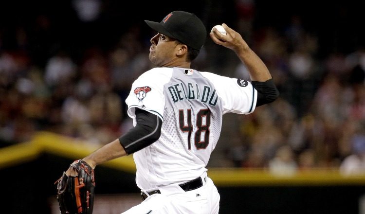 Delgado tiene efectividad de 3.56 y marca de 1-1 en 43 entradas lanzadas este año con Arizona. AP