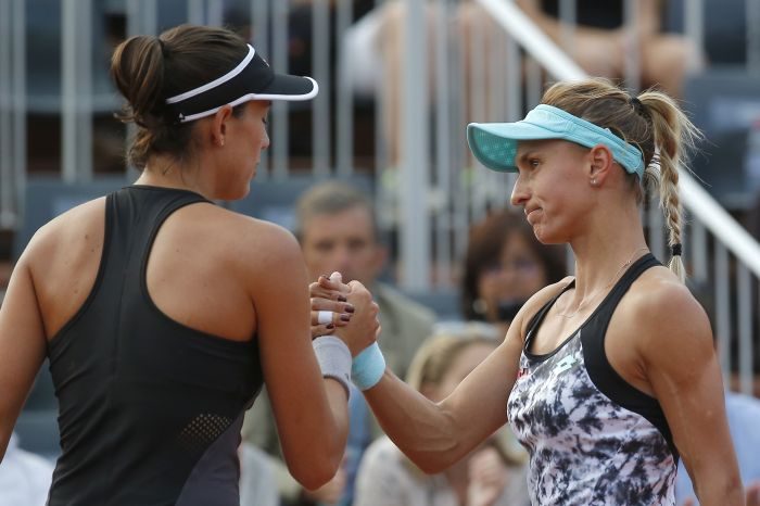 Garbiñe Muguruza y Lesia Tsurenko. Foto AP