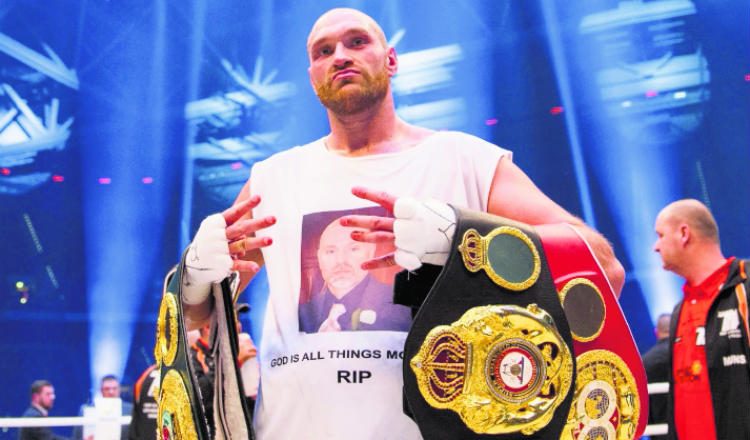 Tyson Fury se ha centrado en su preparación para la pelea titular. Foto AP