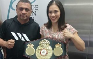 Nataly Delgado, campeona mundial y su entrenador Julio César Archibold.  Foto: Jaime Chávez