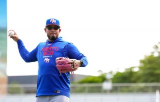 Yadier Molina, piloto del equipo de Puerto Rico. Foto: EFE