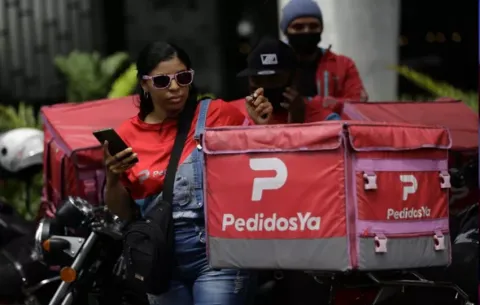 Uber comprará Delivery Hero, dueña de PedidosYa, por $12.000 millones