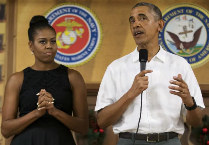 Barack Obama, junto a su esposa Michelle. Foto/ AP