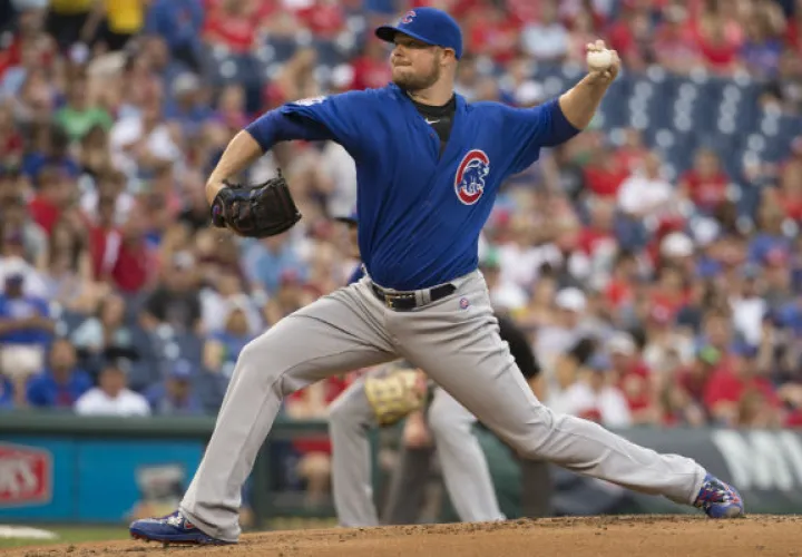 Jon Lester dio trámite a ocho entradas sin admitir carrera./ Foto AP